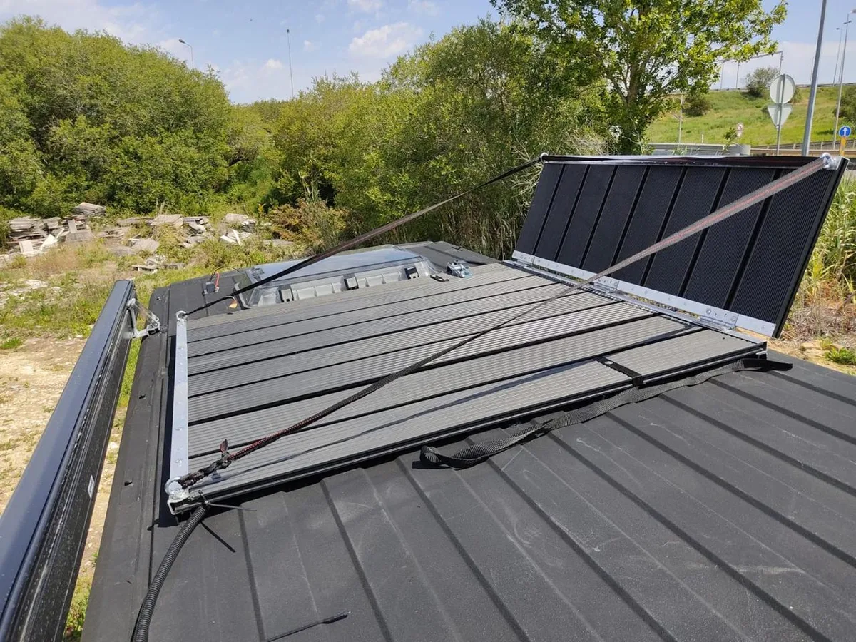 Roof rack with solar panels and observation deck