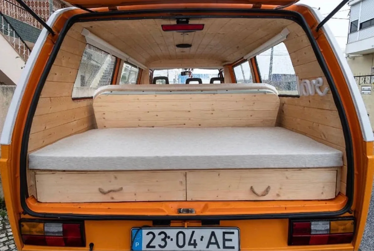 Bench seat folded for travel mode, seen from the tailgate
