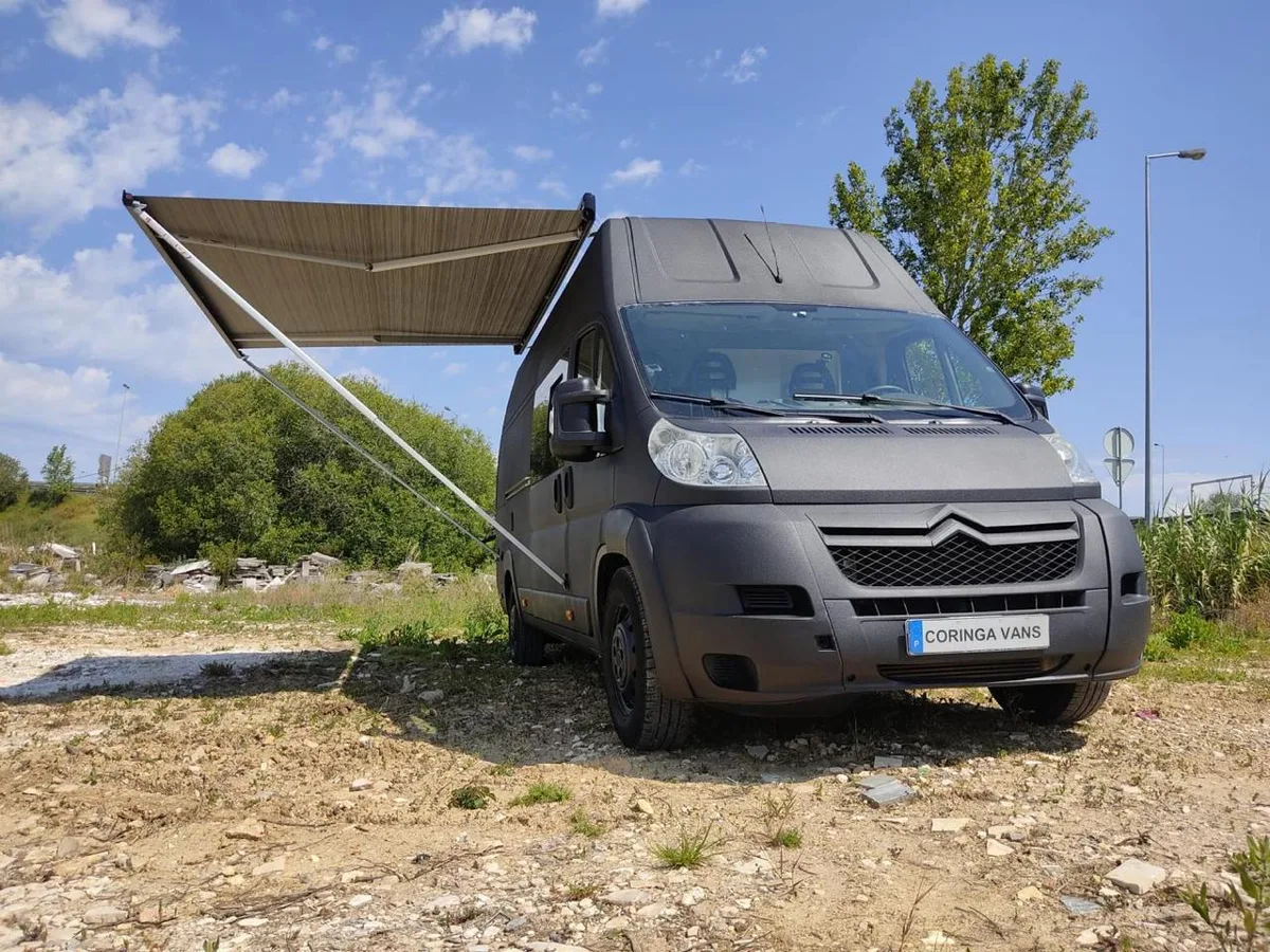 Side awning fully extended for outdoor comfort