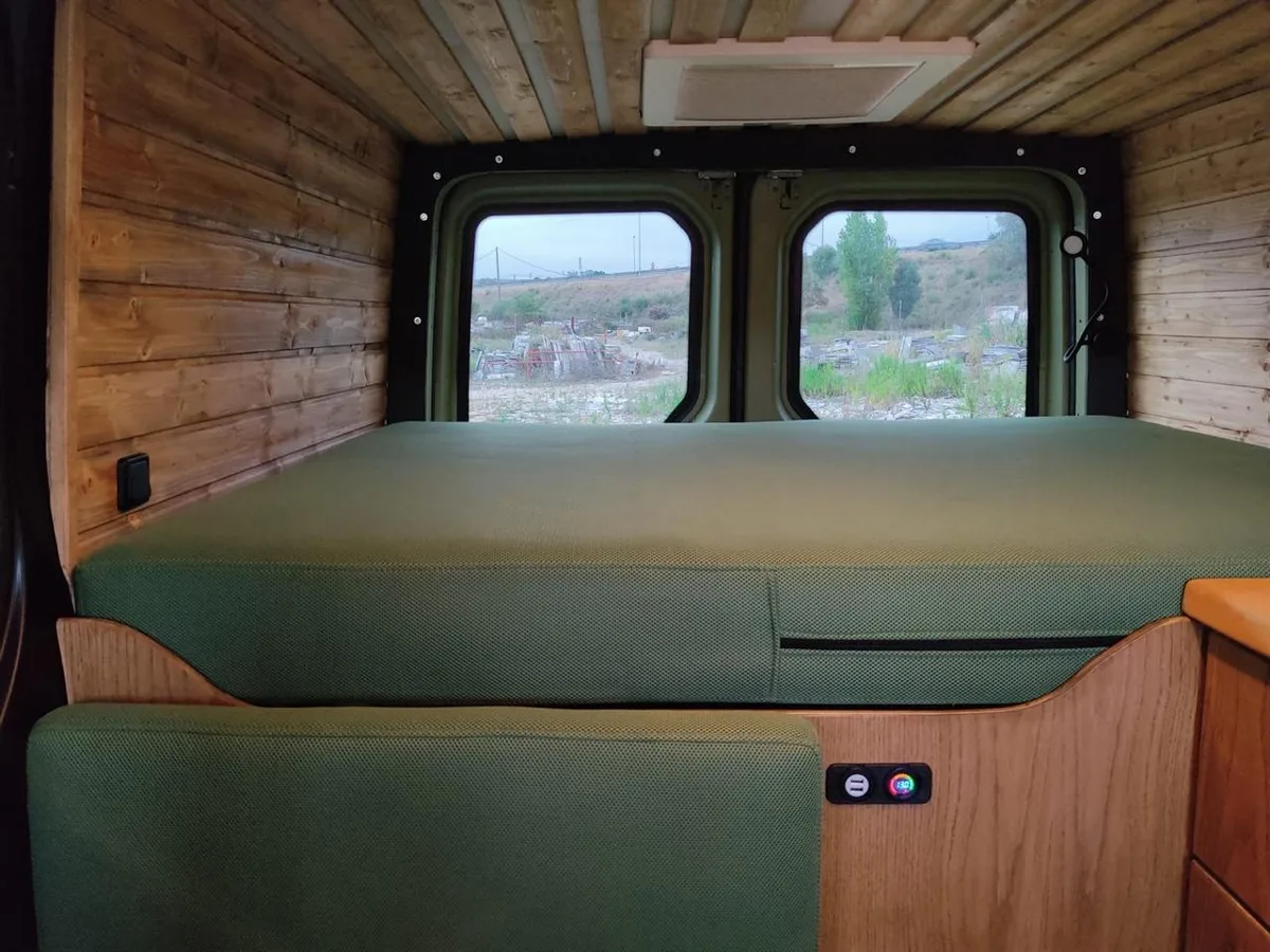 Rear double bed with military green upholstery