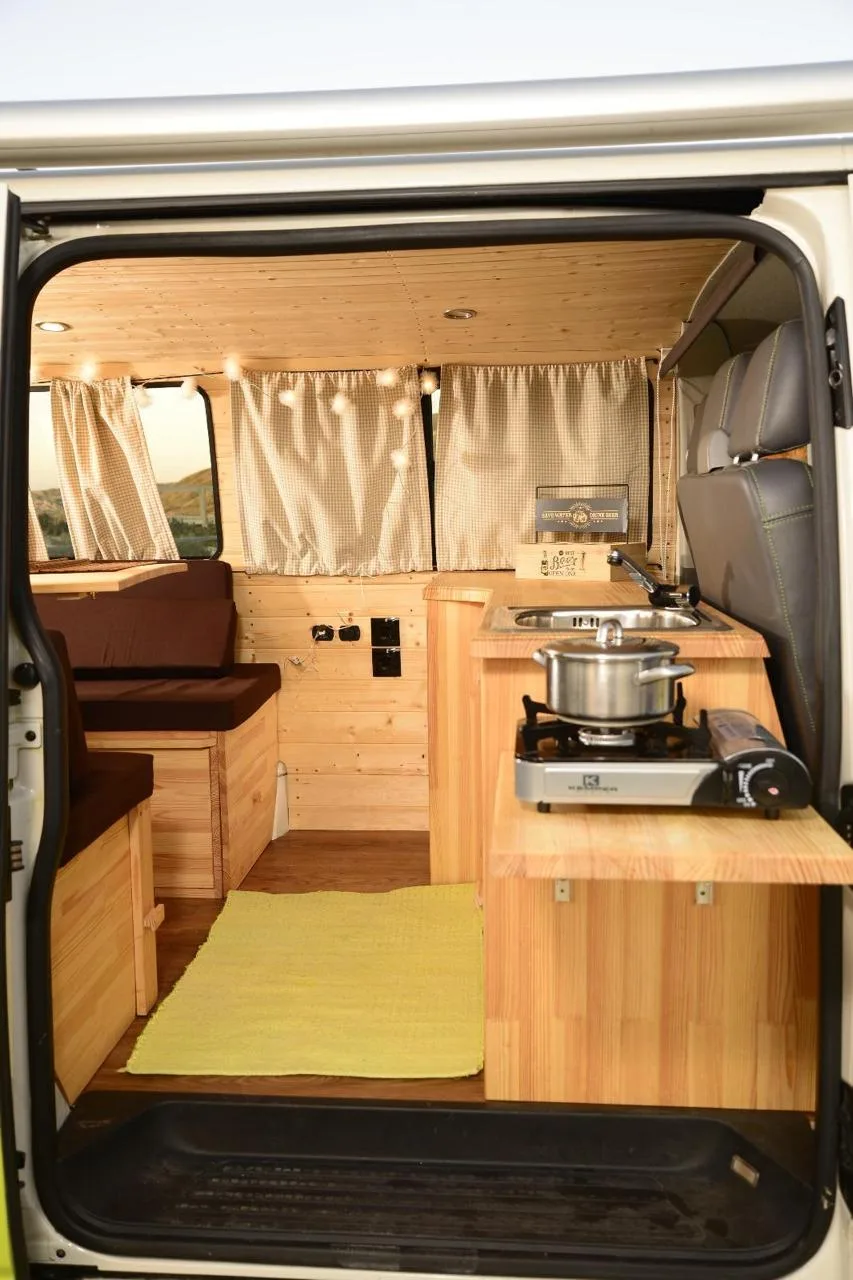 Side door interior — kitchen with stove and wooden counter