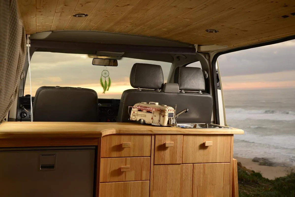 Rear view at sunset with open awning by the ocean