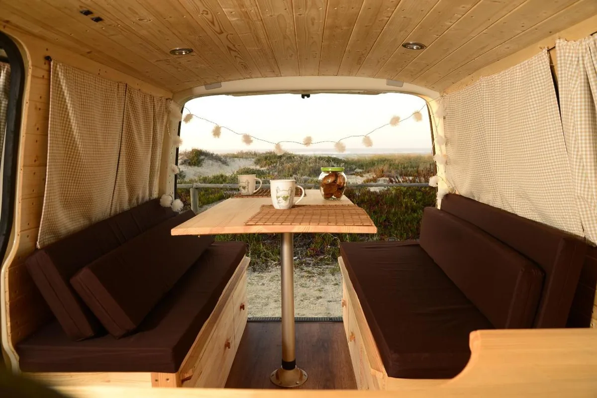 Flat bed with green pillows, sea view